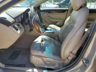 2009 Cadillac CTS RWD with VIN 1G6DF577090143935, listed as a Copart auction lot 54719885 with 158,801 mi miles and Salvage Title. Bid and sale history available at DreamBid. Image 7.