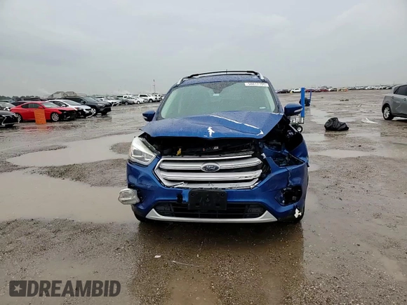 2018 Ford Escape Titanium with VIN 1FMCU9J98JUB31234, listed as a Copart auction lot 58817705 with 140,183 mi miles and Salvage title. Bid and sale history available at DreamBid. Image 14.