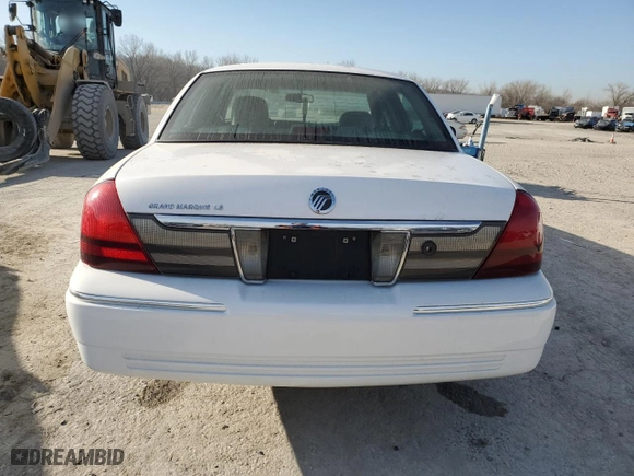 2010 Mercury Grand Marquis LS with VIN 2MEBM7FV7AX614134, listed as a Copart auction lot 48724825 with 129,960 mi miles and Salvage Title. Bid and sale history available at carsss.com. Image 6.