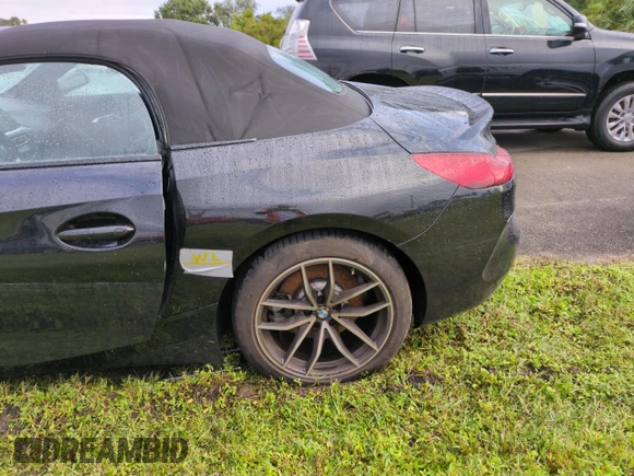 2022 BMW Z4 sDrive30i with VIN WBAHF3C04NWX42062, listed as a Copart auction lot 74989854 with 0 mi miles and Salvage Title. Bid and sale history available at carsss.com. Image 12.
