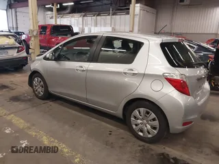 2013 Toyota Yaris L with VIN JTDKTUD36DD557084, listed as a IAAI auction lot 41502228 with 174,185 mi miles. Bid and sale history available at carsss.com. Image 3.