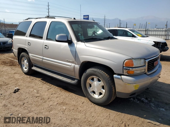 2004 GMC Yukon SLT with VIN 1GKEK13Z34J235318, listed as a Copart auction lot 74971334 with 189,771 mi miles and Salvage Title. Bid and sale history available at carsss.com. Image 4.