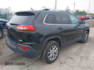 2014 Jeep Cherokee Latitude z VIN 1C4PJMCS5EW219542, wystawiony jako IAAI lot #40950309 z przebiegiem 154 099 mil mil oraz . Historia ofert i sprzedaży dostępna na DreamBid. Obrazek 4.