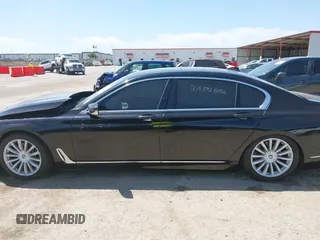 2017 BMW 7 Series 740i xDrive with VIN WBA7E4C50HGU99106, listed as a IAAI auction lot 41997603 with 138,322 mi miles. Bid and sale history available at carsss.com. Image 14.