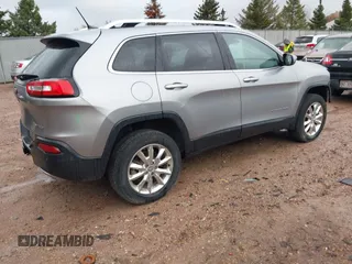 2014 Jeep Cherokee Limited with VIN 1C4PJMDS3EW280399, listed as a IAAI auction lot 40737977 with 131,595 mi miles. Bid and sale history available at carsss.com. Image 4.