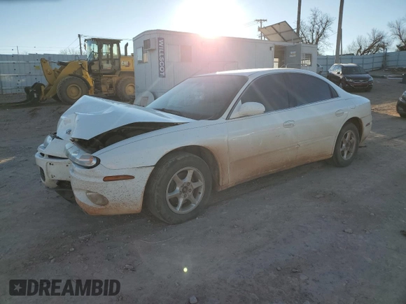 2002 Oldsmobile Aurora z VIN 1G3GR64H024127902, wystawiony jako Copart lot #86681674 z przebiegiem Nie podano mil oraz Szkoda całkowita • Salvage title. Historia ofert i sprzedaży dostępna na DreamBid. Obrazek 1.