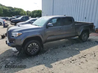 2021 Toyota Tacoma SR5 with VIN 3TYDZ5BN9MT001619, listed as a Copart auction lot 58981155 with 118,335 mi miles and Salvage title. Bid and sale history available at DreamBid. Image 1.
