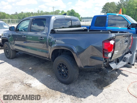 2021 Toyota Tacoma SR z VIN 3TMCZ5AN2MM392590, wystawiony jako IAAI lot #42178072 z przebiegiem 42 542 mil mil oraz . Historia ofert i sprzedaży dostępna na DreamBid. Obrazek 3.