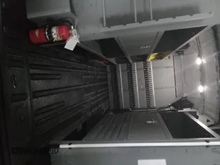 2023 Ford Transit Cargo z VIN 1FTBR1X86PKC02291, wystawiony jako IAAI lot #42791621 z przebiegiem 32 389 mil mil oraz . Historia ofert i sprzedaży dostępna na DreamBid. Obrazek 15.
