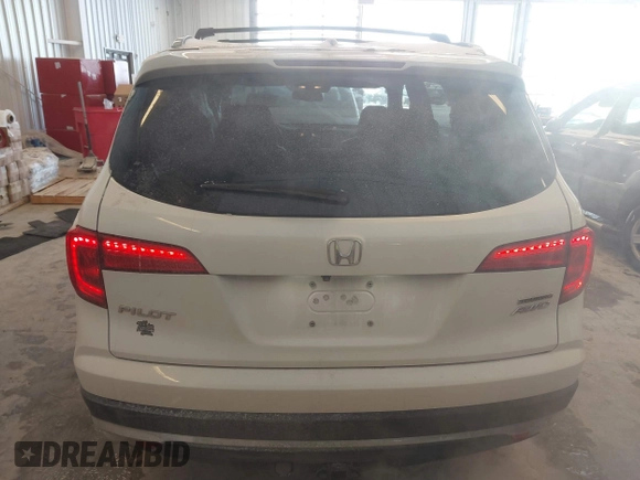 2017 Honda Pilot Touring with VIN 5FNYF6H92HB032873, listed as a IAAI auction lot 41608870 with 123,888 mi miles. Bid and sale history available at carsss.com. Image 16.