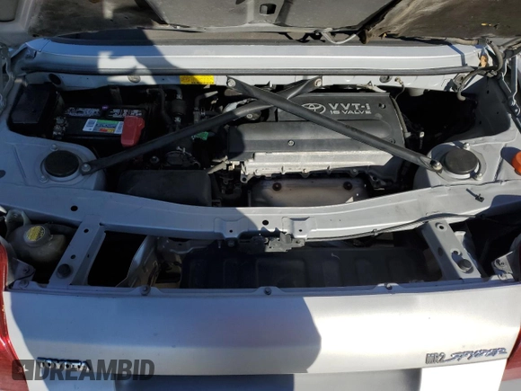 2003 Toyota MR2 z VIN JTDFR320330059885, wystawiony jako Copart lot #86158554 z przebiegiem 178 809 mil mil oraz Szkoda całkowita • Salvage title. Historia ofert i sprzedaży dostępna na DreamBid. Obrazek 13.