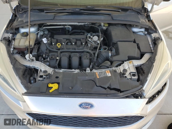 2016 Ford Focus SE with VIN 1FADP3F27GL336945, listed as a Copart auction lot 57811575 with 134,015 mi miles and Salvage title. Bid and sale history available at DreamBid. Image 11.