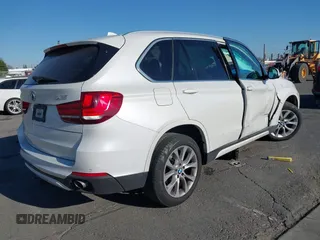 2014 BMW X5 sDrive35i with VIN 5UXKR2C54E0C01376, listed as a IAAI auction lot 41647680 with 50,941 mi miles. Bid and sale history available at carsss.com. Image 4.