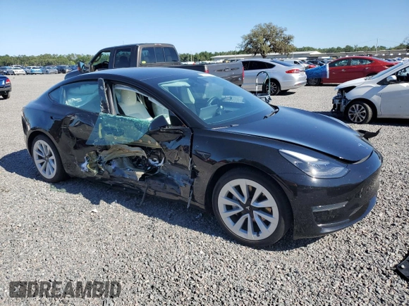 2022 Tesla Model 3 with VIN 5YJ3E1EA5NF102554, listed as a Copart auction lot 53195075 with 62,453 mi miles and Salvage Title. Bid and sale history available at DreamBid. Image 4.