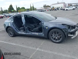 2023 Tesla Model 3 with VIN 5YJ3E1EA4PF410060, listed as a IAAI auction lot 42067624 with 59,934 mi miles and . Bid and sale history available at DreamBid. Image 19.