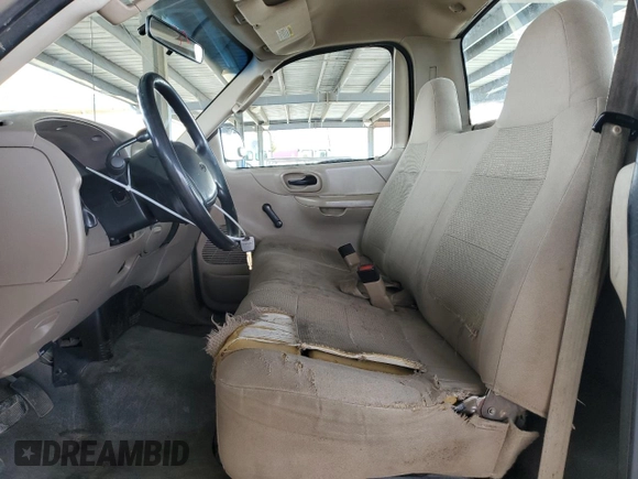2002 Ford F-150 XL with VIN 1FTRF17W62NB40159, listed as a Copart auction lot 49010765 with 166,719 mi miles and Salvage Title. Bid and sale history available at carsss.com. Image 7.