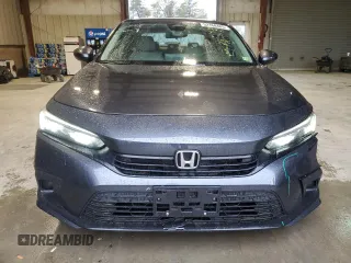 2024 Honda Civic LX z VIN 2HGFE2F24RH524522, wystawiony jako Copart lot #52168485 z przebiegiem 8503 mil mil oraz Szkoda całkowita • Salvage title. Historia ofert i sprzedaży dostępna na DreamBid. Obrazek 5.