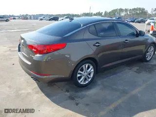 2013 Kia Optima EX with VIN 5XXGN4A73DG110032, listed as a IAAI auction lot 41800308 with 275,741 mi miles. Bid and sale history available at carsss.com. Image 4.