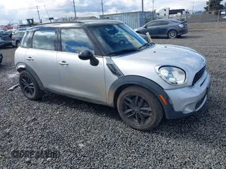 2014 MINI Countryman S z VIN WMWZC3C56EWP26003, wystawiony jako IAAI lot #41884630 z przebiegiem 101 683 mil mil oraz . Historia ofert i sprzedaży dostępna na DreamBid. Obrazek 1.