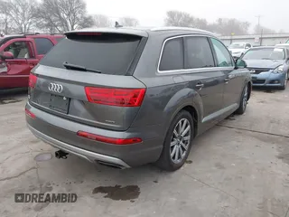 2018 Audi Q7 Premium Plus with VIN WA1LHAF70JD040387, listed as a IAAI auction lot 41087797 with 75,031 mi miles. Bid and sale history available at carsss.com. Image 4.