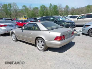 1999 Mercedes-Benz SL-Class with VIN WDBFA68F1XF183885, listed as a IAAI auction lot 42085175 with 133,333 mi miles. Bid and sale history available at carsss.com. Image 3.