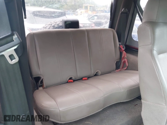 2004 Jeep Wrangler SE with VIN 1J4FA291X4P720783, listed as a IAAI auction lot 42446334 with 69,672 mi miles and . Bid and sale history available at DreamBid. Image 8.