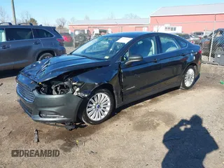 2015 Ford Fusion S Hybrid with VIN 3FA6P0UU7FR117785, listed as a IAAI auction lot 41589546 with 136,657 mi miles. Bid and sale history available at carsss.com. Image 17.