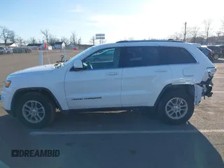 2019 Jeep Grand Cherokee Laredo E with VIN 1C4RJFAG7KC694674, listed as a IAAI auction lot 41591678 with 61,144 mi miles. Bid and sale history available at carsss.com. Image 14.