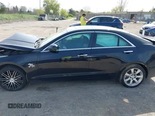 2014 Cadillac ATS Standard AWD with VIN 1G6AG5RX6E0105293, listed as a IAAI auction lot 42142760 with 138,313 mi miles and . Bid and sale history available at DreamBid. Image 15.