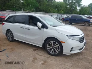 2021 Honda Odyssey Touring z VIN 5FNRL6H82MB024271, wystawiony jako IAAI lot #41934882 z przebiegiem 89 632 mil mil oraz . Historia ofert i sprzedaży dostępna na DreamBid. Obrazek 1.