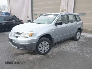 2005 Mitsubishi Outlander LS with VIN JA4LX31F25U045299, listed as a IAAI auction lot 41339369 with 100,697 mi miles. Bid and sale history available at carsss.com. Image 2.
