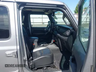2018 Jeep Wrangler Unlimited Sahara z VIN 1C4HJXEG2JW124882, wystawiony jako IAAI lot #42437816 z przebiegiem Nie podano mil oraz . Historia ofert i sprzedaży dostępna na DreamBid. Obrazek 5.
