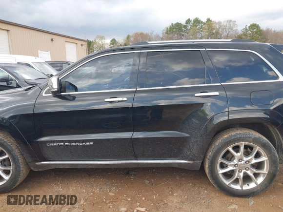 2015 Jeep Grand Cherokee Summit with VIN 1C4RJFJT1FC768707, listed as a IAAI auction lot 41863454 with 122,564 mi miles. Bid and sale history available at carsss.com. Image 14.