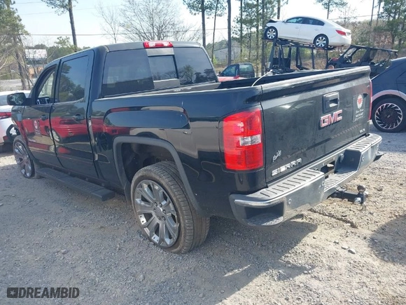 2015 GMC Sierra 1500 SLE with VIN 3GTU2UEC9FG338474, listed as a IAAI auction lot 41899379 with 140,859 mi miles. Bid and sale history available at carsss.com. Image 3.