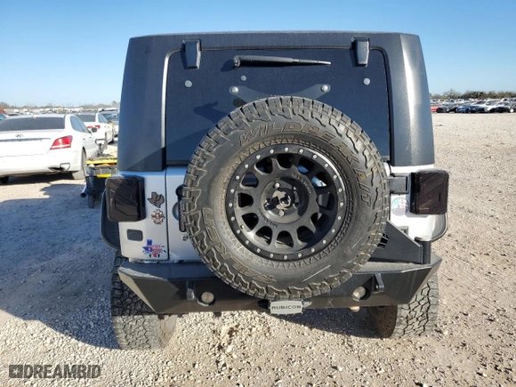 2009 Jeep Wrangler Rubicon with VIN 1J8GA64159L700909, listed as a Copart auction lot 86308954 with 138,065 mi miles and Salvage Title. Bid and sale history available at carsss.com. Image 6.