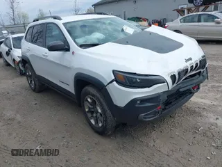 2019 Jeep Cherokee Trailhawk Elite with VIN 1C4PJMBX4KD351261, listed as a IAAI auction lot 41944727 with 97,849 mi miles. Bid and sale history available at carsss.com. Image 1.
