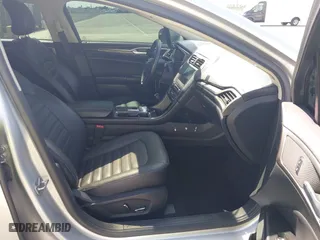 2017 Ford Fusion Energi SE with VIN 3FA6P0PU8HR242177, listed as a IAAI auction lot 42057898 with 119,435 mi miles. Bid and sale history available at carsss.com. Image 5.