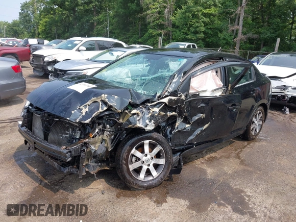 2012 Nissan Sentra S z VIN 3N1AB6AP7CL735517, wystawiony jako IAAI lot #42390746 z przebiegiem 141 203 mil mil oraz . Historia ofert i sprzedaży dostępna na DreamBid. Obrazek 2.