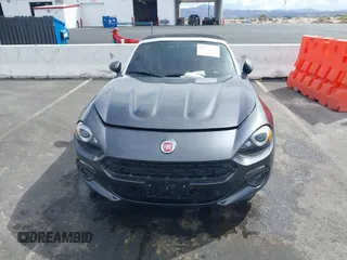2018 FIAT 124 Spider Classica z VIN JC1NFAEK3J0137856, wystawiony jako IAAI lot #41959793 z przebiegiem 49 513 mil mil oraz . Historia ofert i sprzedaży dostępna na DreamBid. Obrazek 12.