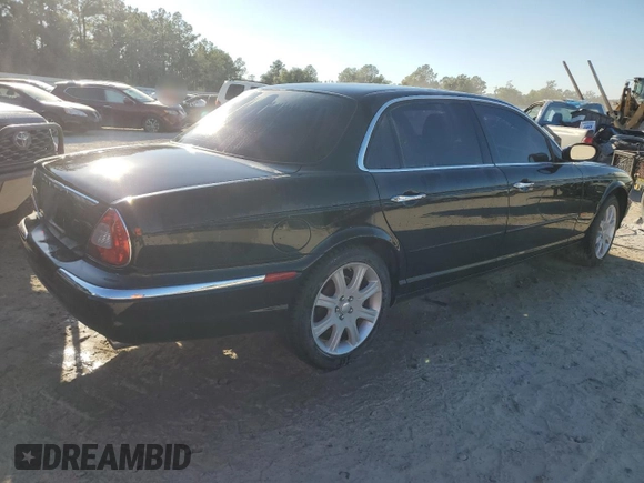 2005 Jaguar XJ Vanden Plas z VIN SAJWA82C05SG47513, wystawiony jako Copart lot #75428654 z przebiegiem 157 442 mil mil oraz Szkoda całkowita • Salvage title. Historia ofert i sprzedaży dostępna na DreamBid. Obrazek 3.