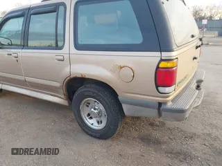 1996 Ford Explorer XL z VIN 1FMDU34X4TUD79706, wystawiony jako IAAI lot #41105853 z przebiegiem 152 175 mil mil oraz . Historia ofert i sprzedaży dostępna na DreamBid. Obrazek 15.