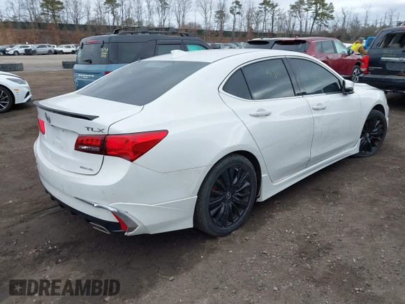 2019 Acura TLX w/Advance Pkg with VIN 19UUB3F84KA003847, listed as a IAAI auction lot 41735006 with 999,999 mi miles. Bid and sale history available at carsss.com. Image 4.
