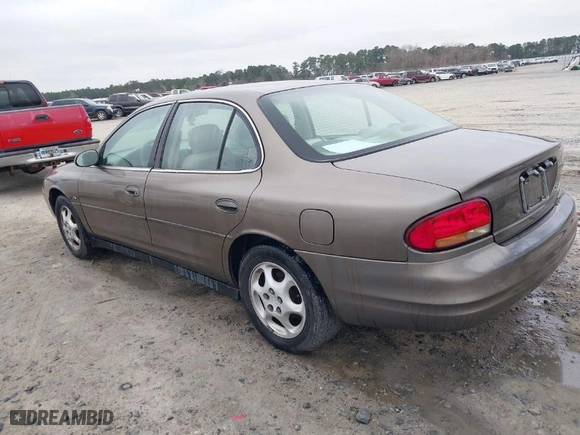 1999 Oldsmobile Intrigue GLS with VIN 1G3WX52H6XF321750, listed as a IAAI auction lot 41505500 with 180,036 mi miles. Bid and sale history available at carsss.com. Image 3.