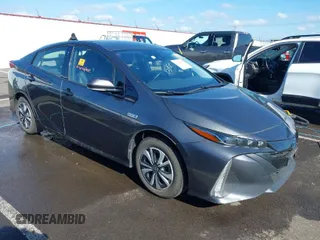 2018 Toyota Prius Plus with VIN JTDKARFP5J3085996, listed as a IAAI auction lot 41723436 with Not Provided miles and . Bid and sale history available at DreamBid. Image 1.