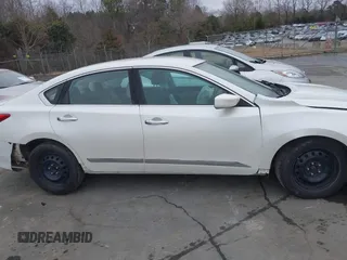 2016 Nissan Altima SV with VIN 1N4AL3AP6GC117556, listed as a IAAI auction lot 41496029 with 199,594 mi miles and . Bid and sale history available at DreamBid. Image 13.