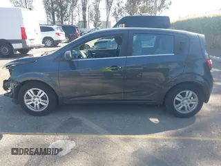 2014 Chevrolet Sonic LT with VIN 1G1JC6SG4E4118781, listed as a IAAI auction lot 41862192 with 124,375 mi miles. Bid and sale history available at carsss.com. Image 15.