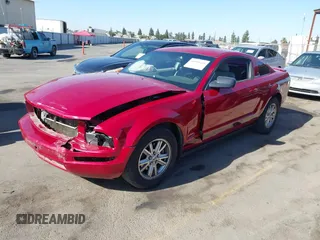 2009 Ford Mustang with VIN 1ZVHT80N795100825, listed as a IAAI auction lot 40588649 with 134,411 mi miles and . Bid and sale history available at carsss.com. Image 2.