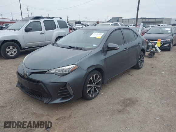 2019 Toyota Corolla L with VIN 5YFBURHE4KP918795, listed as a IAAI auction lot 41546980 with 72,786 mi miles and . Bid and sale history available at DreamBid. Image 2.