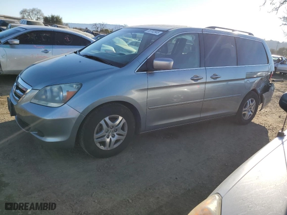 2005 Honda Odyssey EX-L with VIN 5FNRL38725B113023, listed as a Copart auction lot 88782965 with 217,682 mi miles and Salvage Title. Bid and sale history available at carsss.com. Image 1.