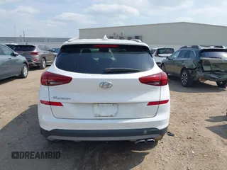 2019 Hyundai Tucson Sport with VIN KM8J33AL1KU861698, listed as a IAAI auction lot 42129173 with 100,160 mi miles. Bid and sale history available at carsss.com. Image 16.
